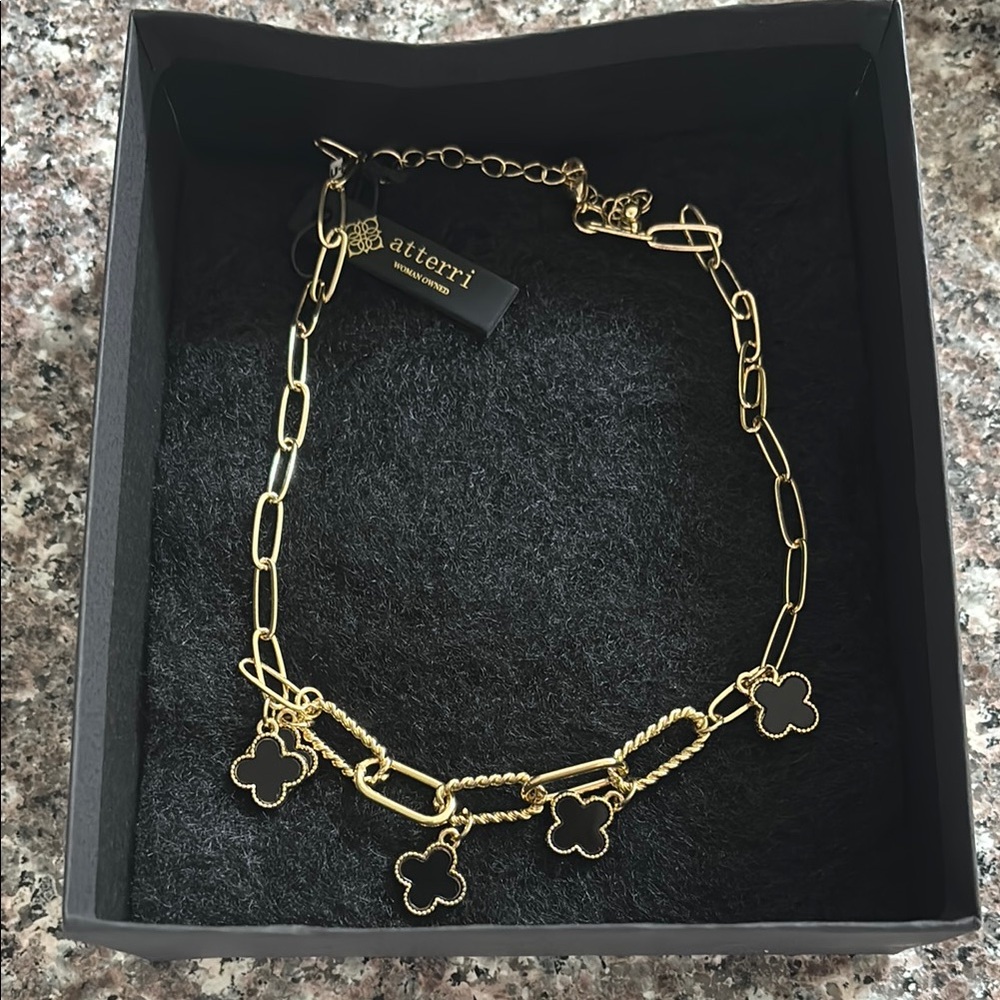 Gold and Black Charm Necklace with Open Link Design